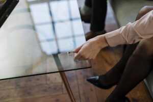 Picture of Woman Placing Ring on Table